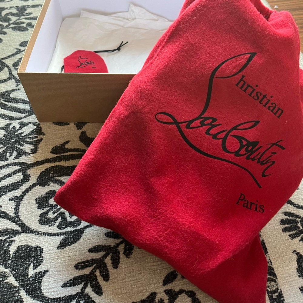 Christian Louboutin. 8.5